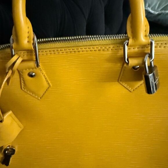 Used excellent condition Louis Vuitton Epi Alma BB with strap - Picture 7 of 16